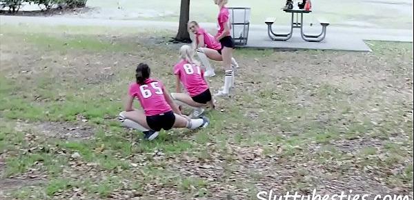  Entire girls football team plays with balls